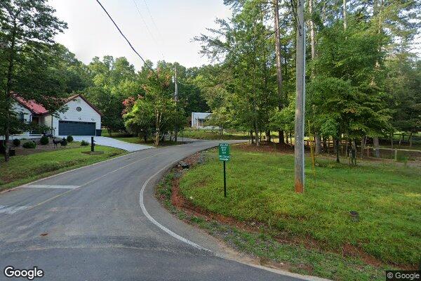Nearby road view of the 0.46-acre property in Ellijay, Georgia.
